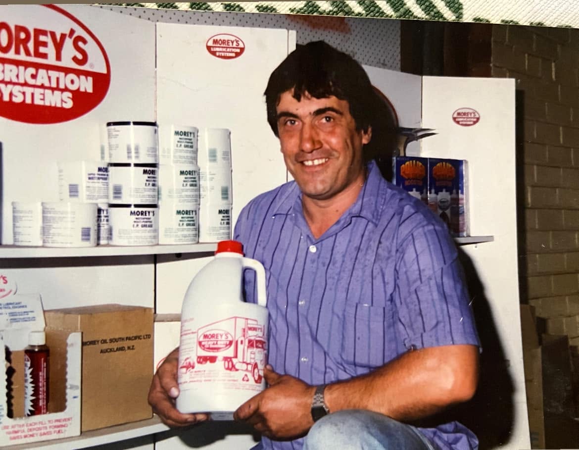 Joe Iannelli holding a Morey's product in front of an early product display